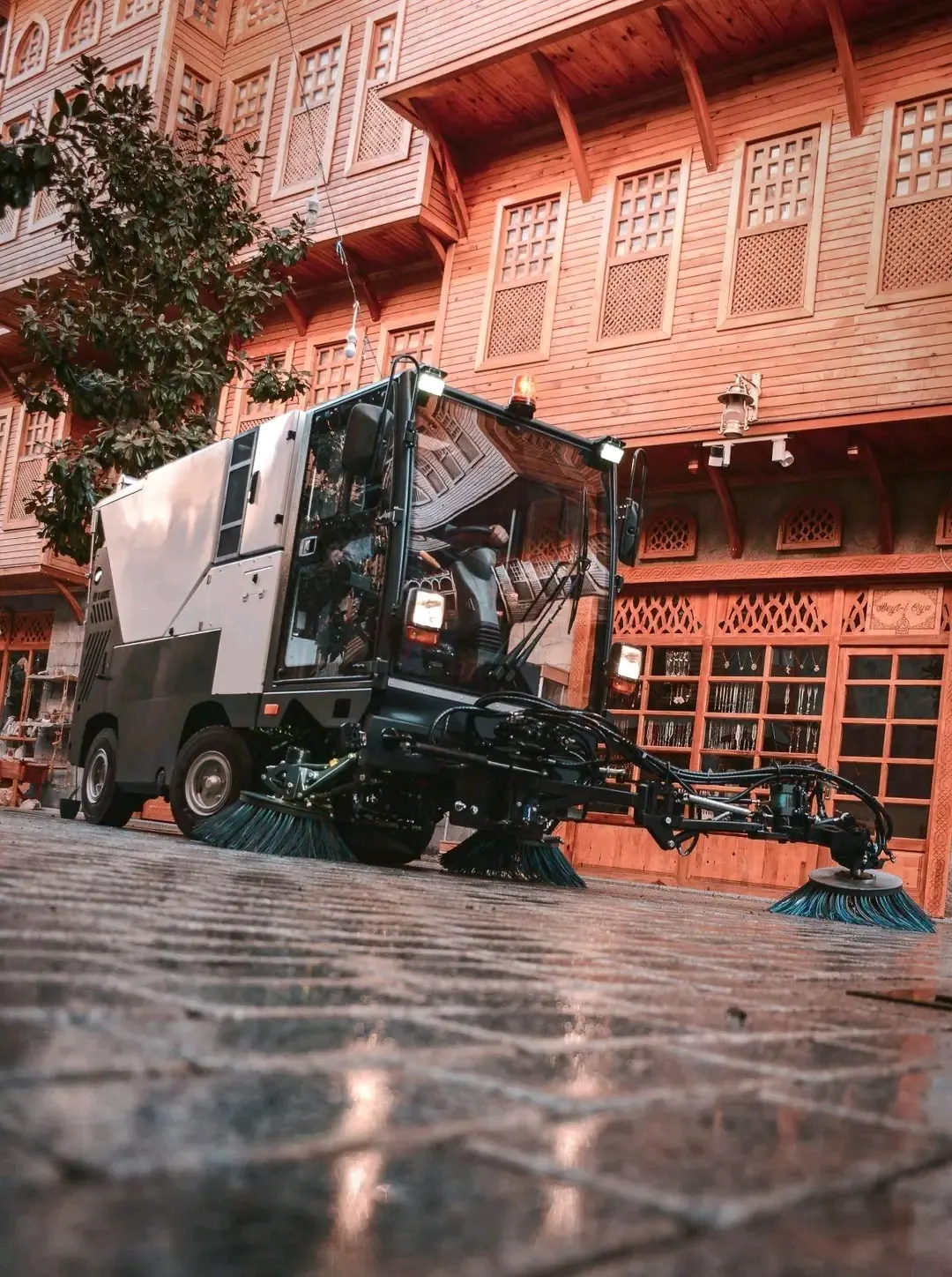 Maxron autonomous floor scrubber in cinematic studio lighting for industrial cleaning