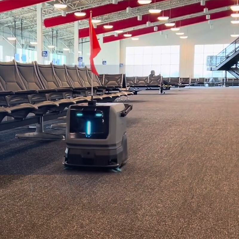 Maxron robotic scrubber cleaning a retail mall and airport terminal floor