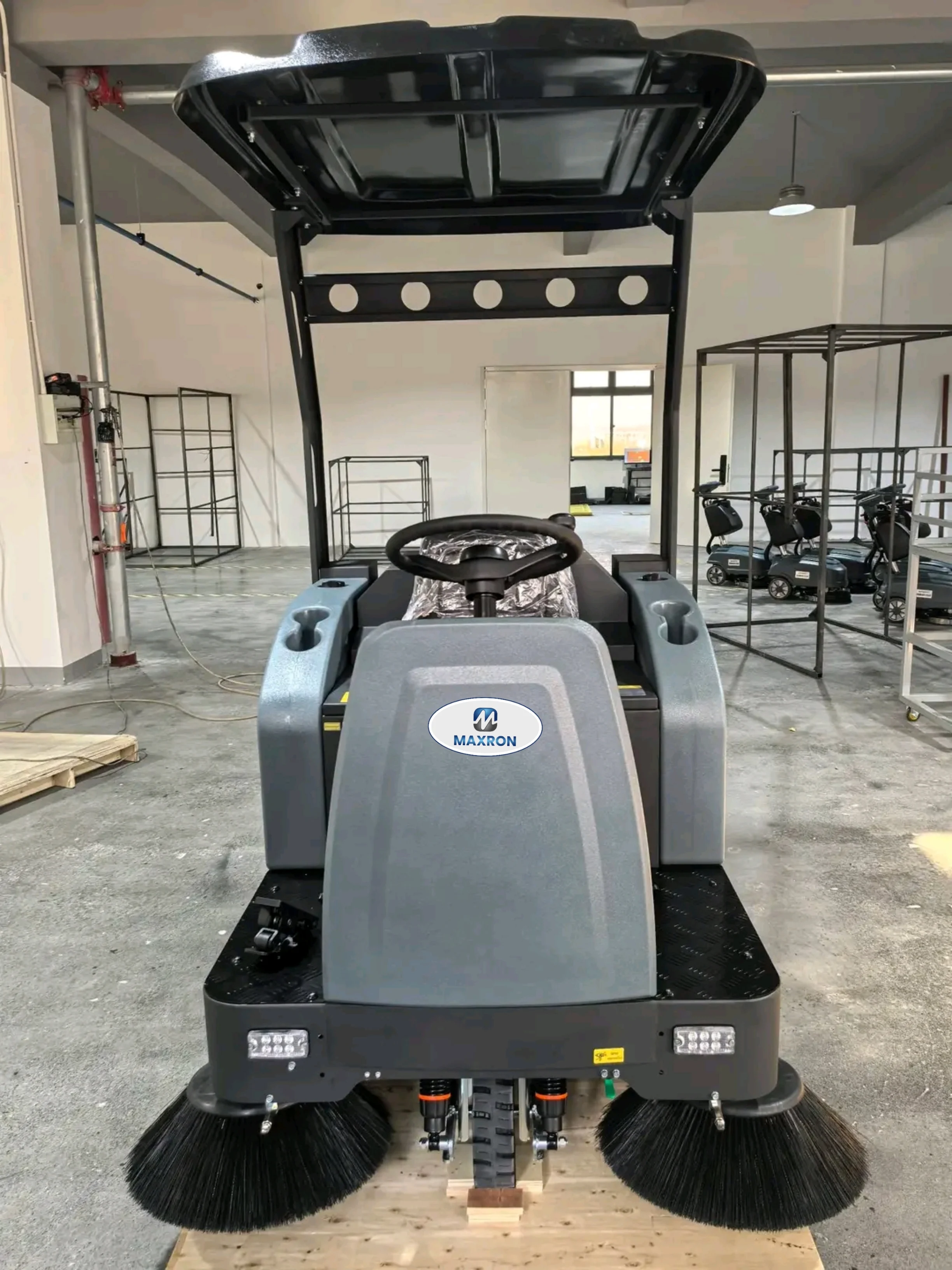 Maxron ride-on sweeper for warehouse and logistics floor cleaning India